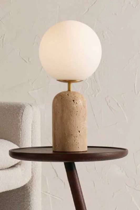leather table lamps with a distressed texture for a rugged charmleather table lamps with a distressed texture for a rugged charmCusco Travertine Table Lamp
